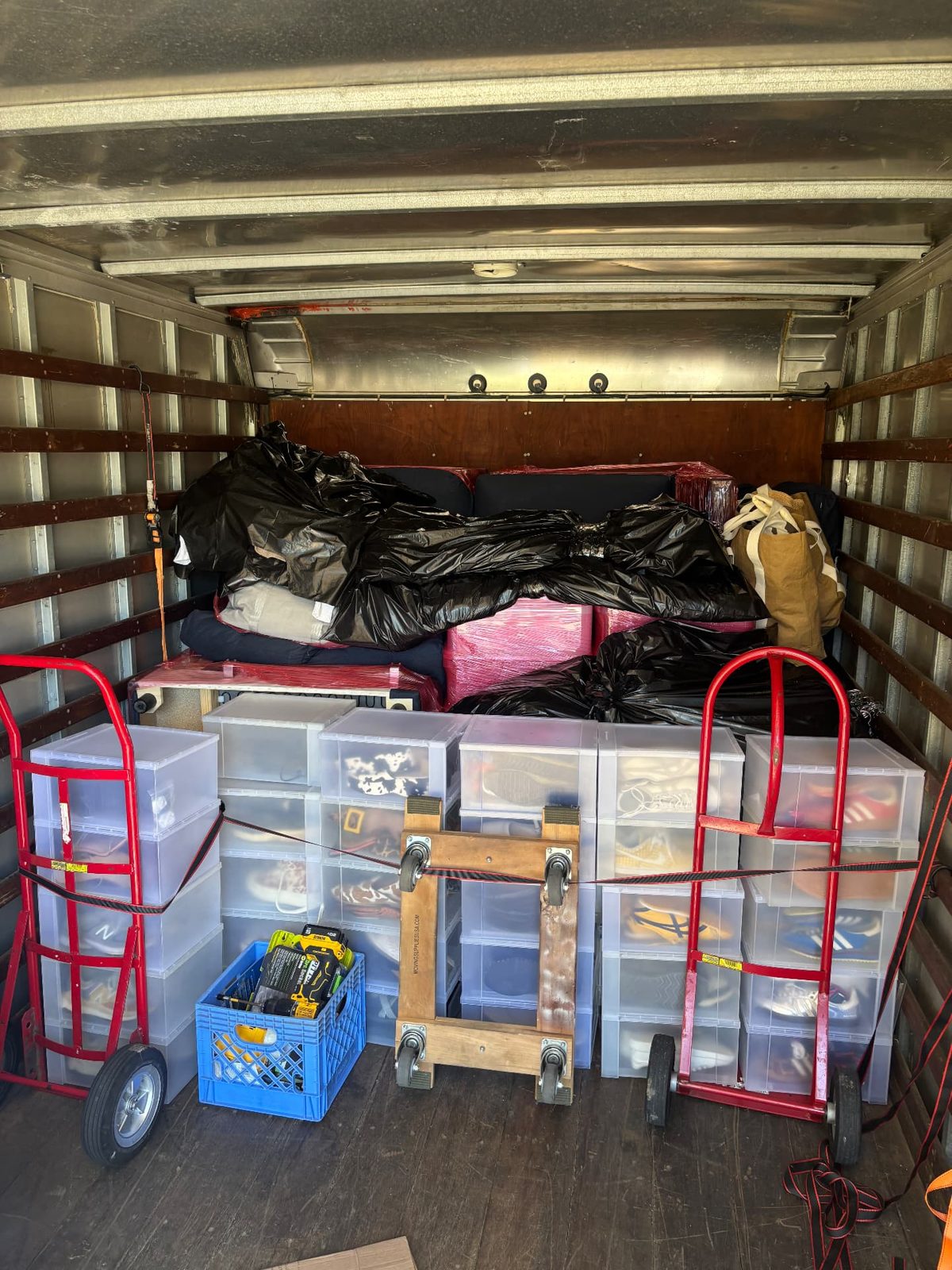 Moving truck neatly packed and strapped for a long-distance move