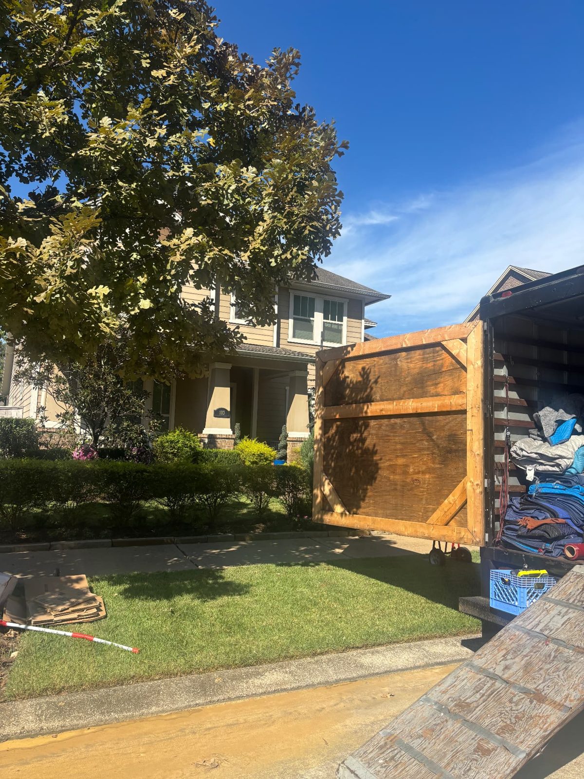 Best Choice Movers truck opened at a Houston-area home during a local move
